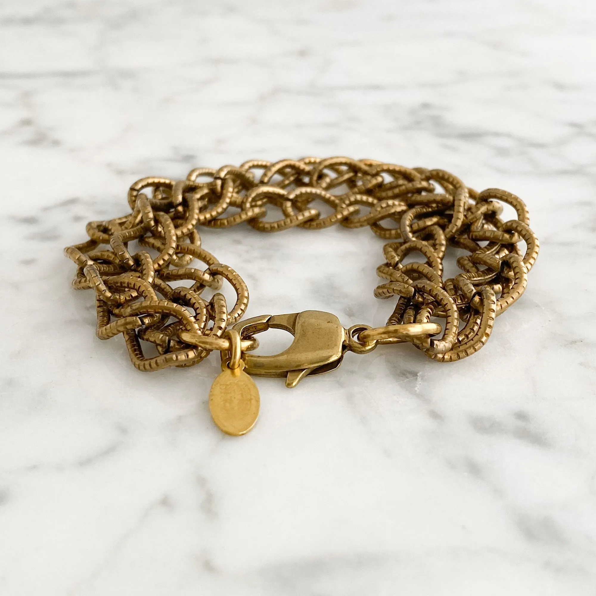 CAGNEY brass multi chain bracelet