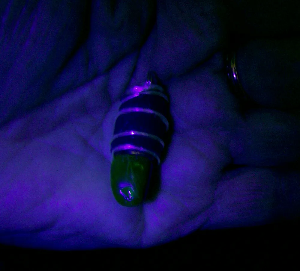 Dominican Green Amber Leather Wrapped Bullet Pendant