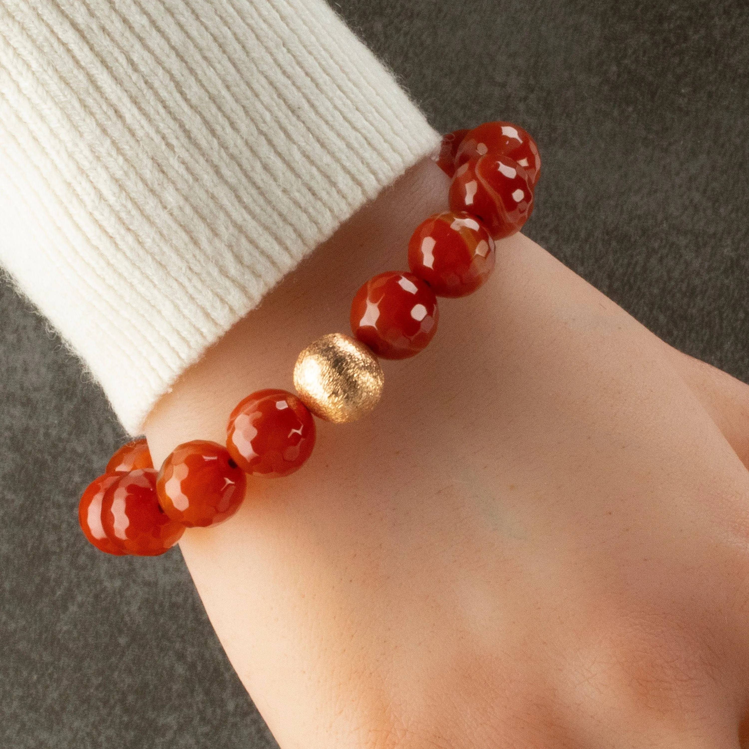 Faceted Carnelian 12mm Gemstone Elastic Bracelet with Matte Gold Accent Bead